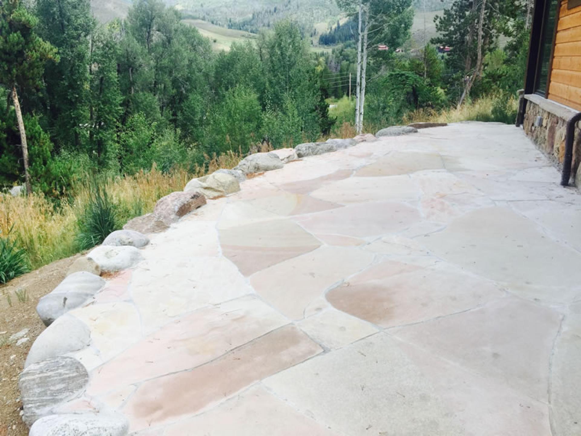 Flagstone Patio Set On Concrete Summit County Colorado Landscaping